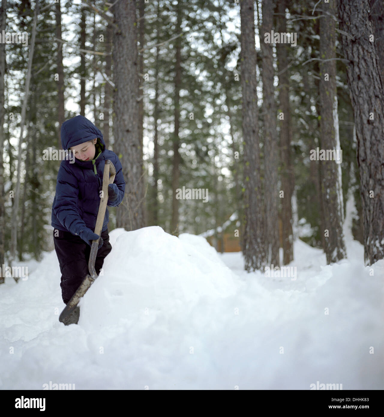 Child shoveling snow hires stock photography and images Alamy