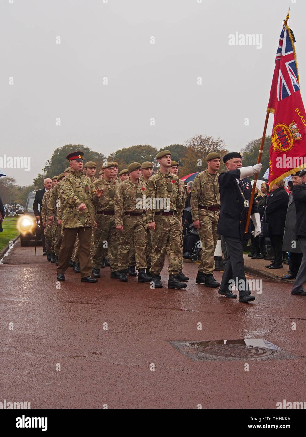 LYTHAM ST ANNES, UK 11TH November 2013. Hearse carrying coffin of WWII 99 year old WWII  war veteran Harold Jellicoe Percival arrives at Lytham Park Cemetery. Credit:  Sue Burton/Alamy Live News Stock Photo