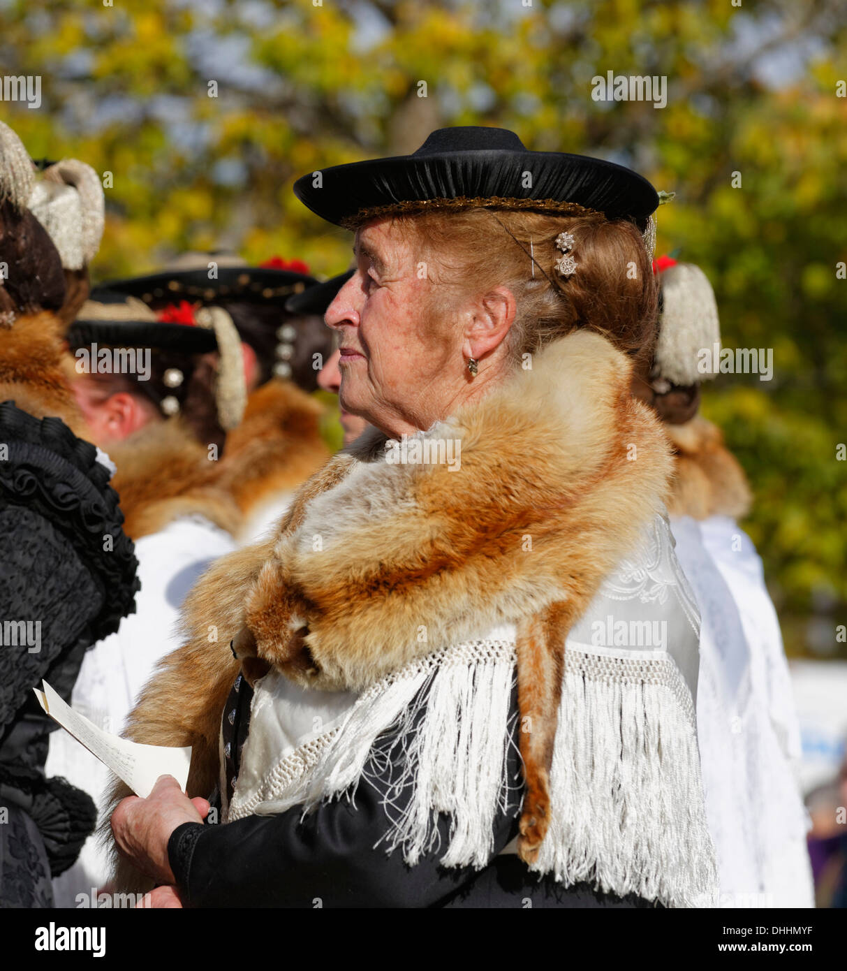 Old woman wearing a fur hat High 