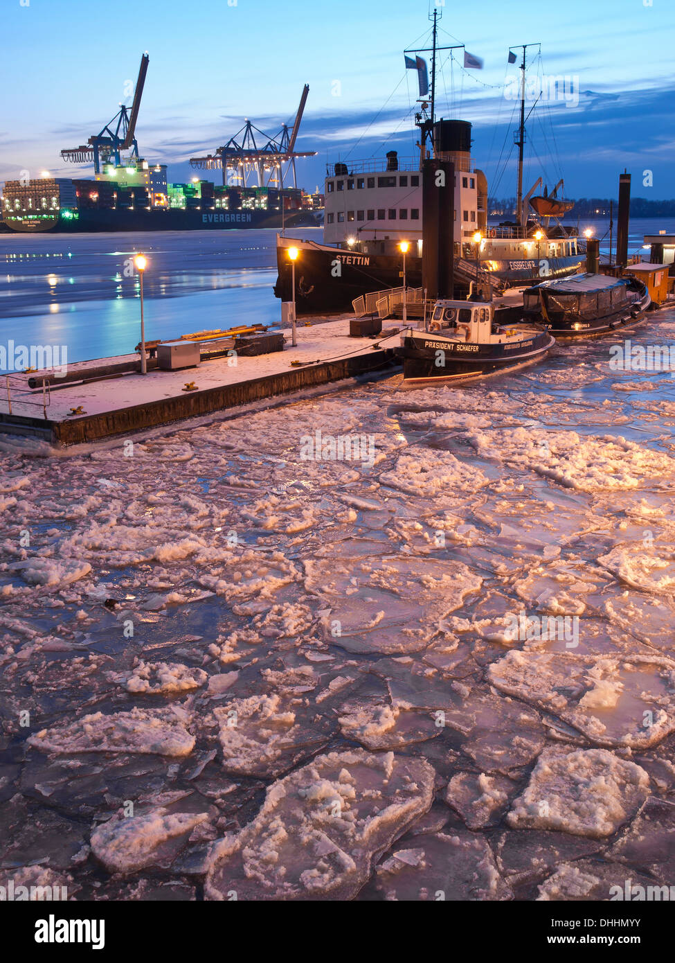 Frozen Elbe river at the harbour museum Oevelgoenne in the evening, Hanseatic City of Hamburg, Germany, Europe Stock Photo