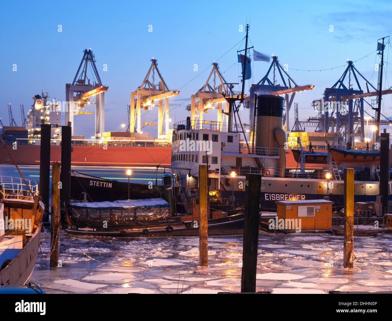 Frozen Elbe river at the harbour museum Oevelgoenne in the evening, Hanseatic City of Hamburg, Germany, Europe Stock Photo