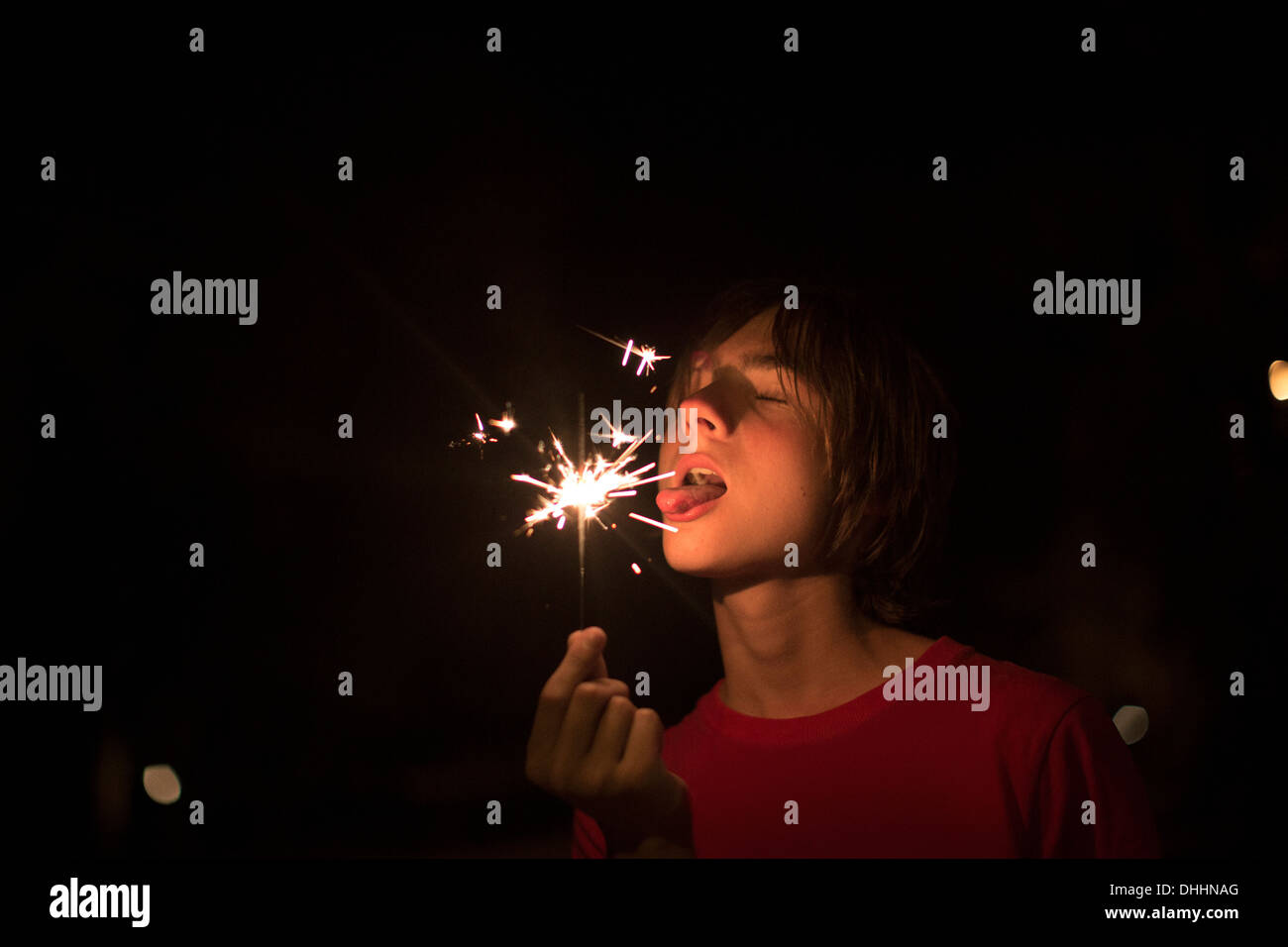 Portrait of boy holding sparkler on independence day, Destin, Florida, USA Stock Photo