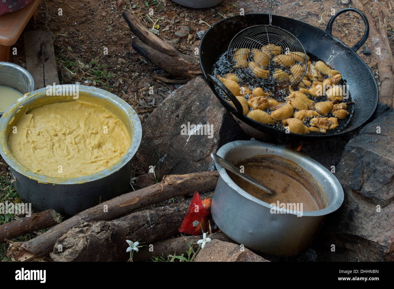Deep fried battered chilli cooking on the street in a rural indian village. Andhra Pradesh, India Stock Photo