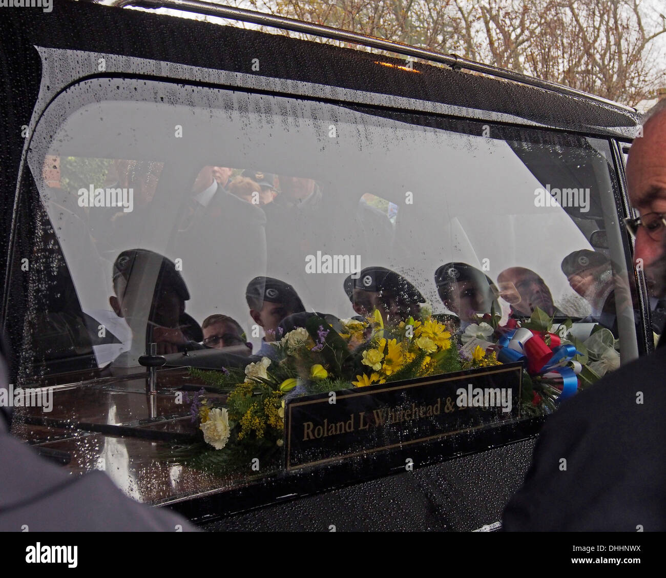 LYTHAM ST ANNES, UK 11TH November 2013. Coffin arrives in hearse at the funeral of 99 year old WWII  war veteran Harold Jellicoe Percival at Lytham Park Cemetery. Credit:  Sue Burton/Alamy Live News Stock Photo