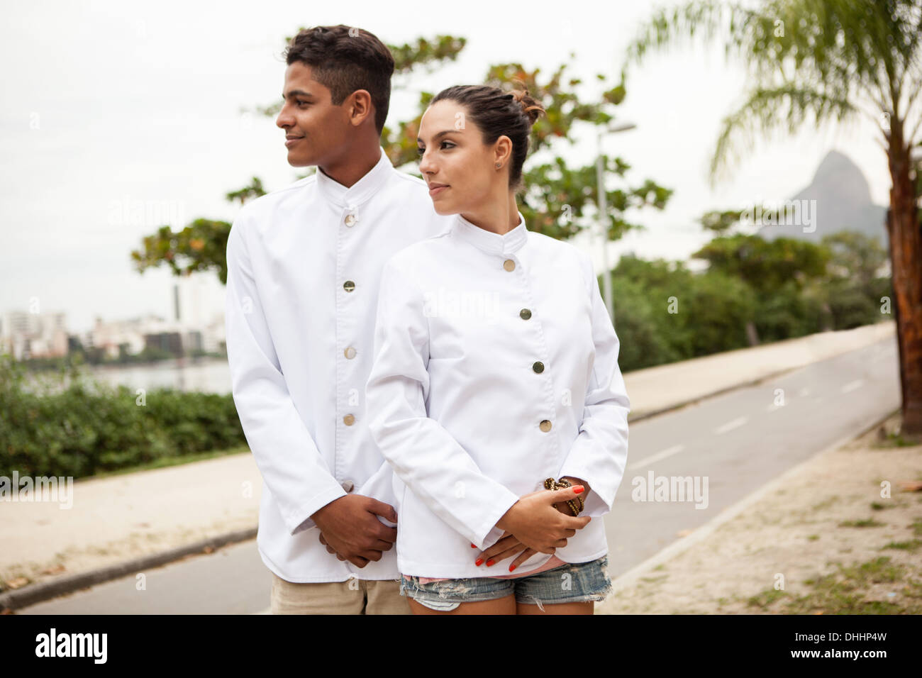 Portrait of young male and female service staff, Rio De Janiero Stock Photo