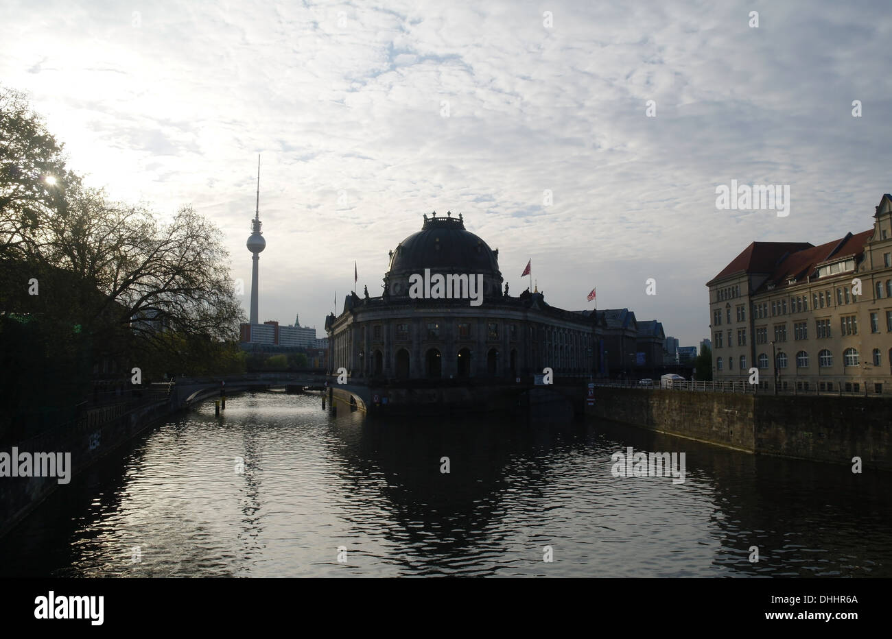 White sky dawn sunrise view, Ertbrucke to Alexanderplatz TV Tower, Bode Museum rising Museum Island, River Spree, Berlin Stock Photo