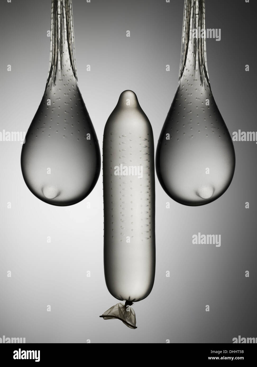 Still life of condoms suggesting male and female anatomy Stock Photo