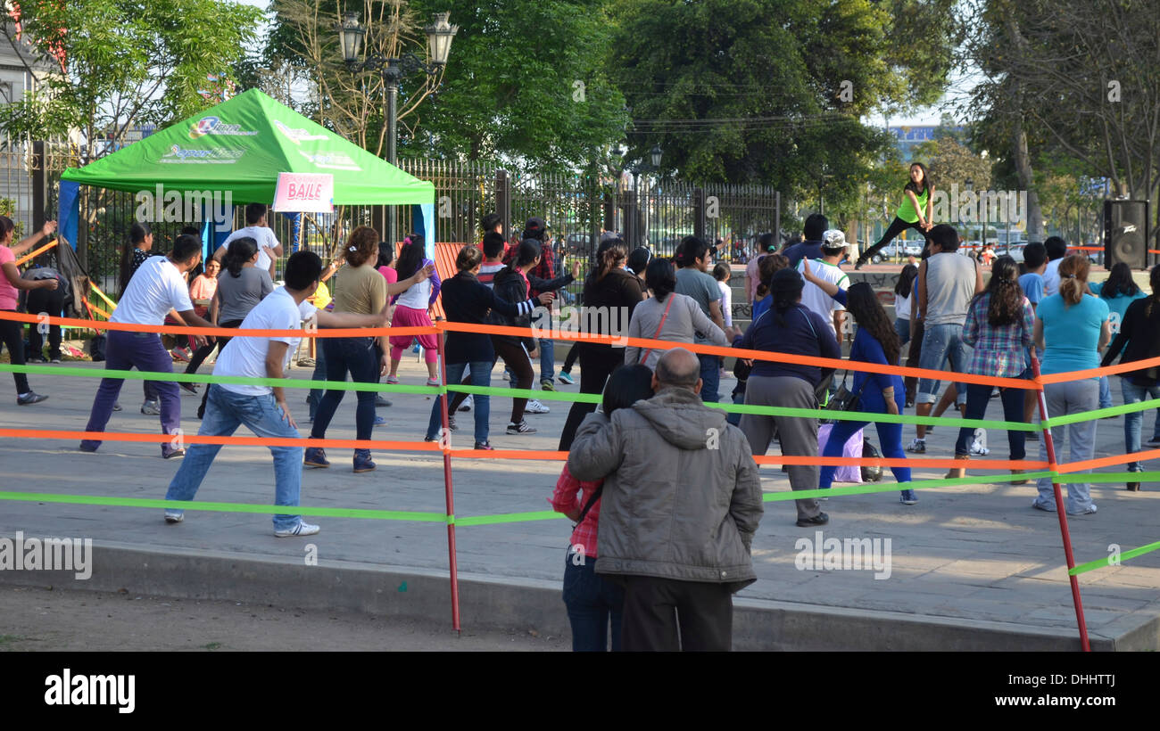 A free public dance class in a park in central Lima, Peru Stock Photo