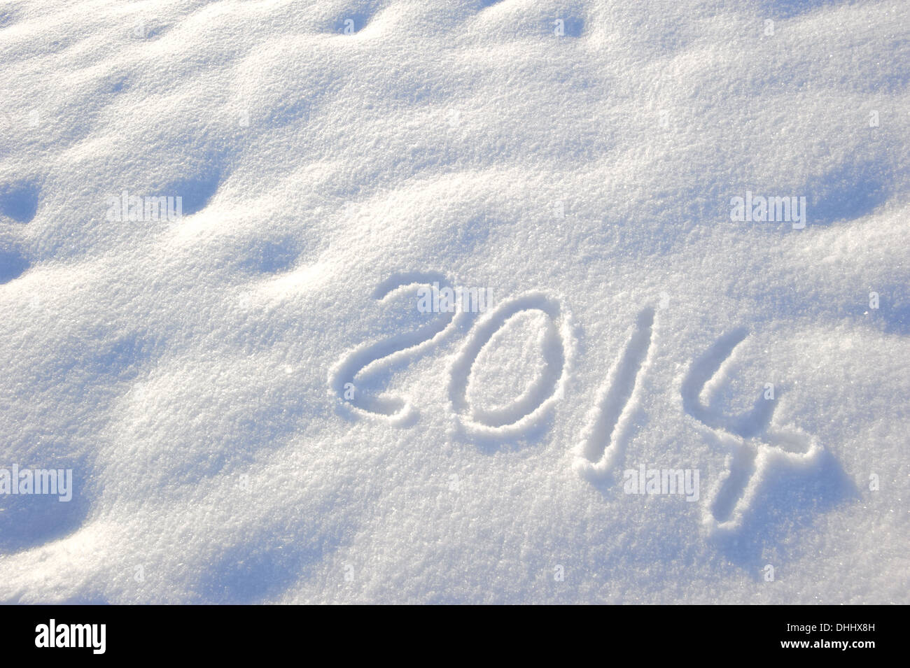 new year 2014 written in snow Stock Photo