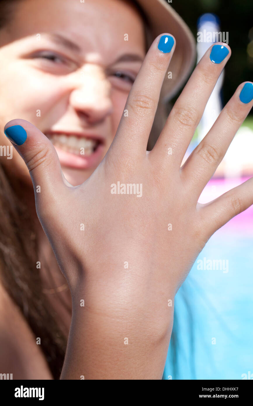 Girl with painted finger nails Stock Photo