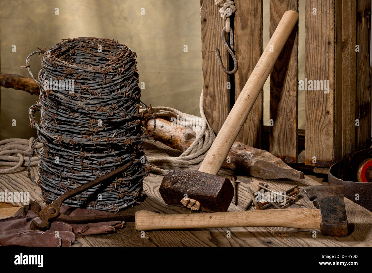 still life with barbed wire and old tools Stock Photo