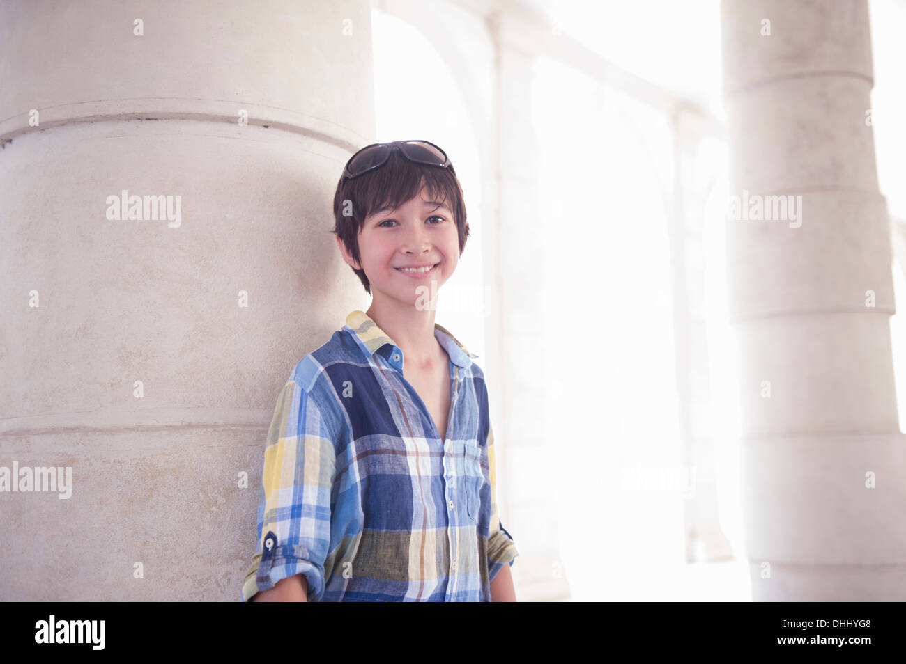 Portrait of boy wearing blue checked shirt Stock Photo - Alamy