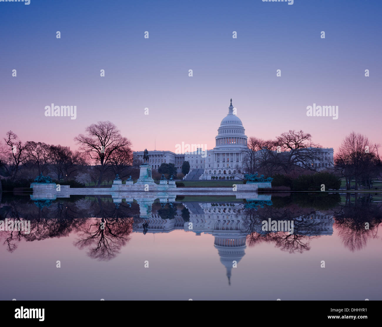 Capitol building in Washington DC at dawn with the reflecting pool, USA Stock Photo