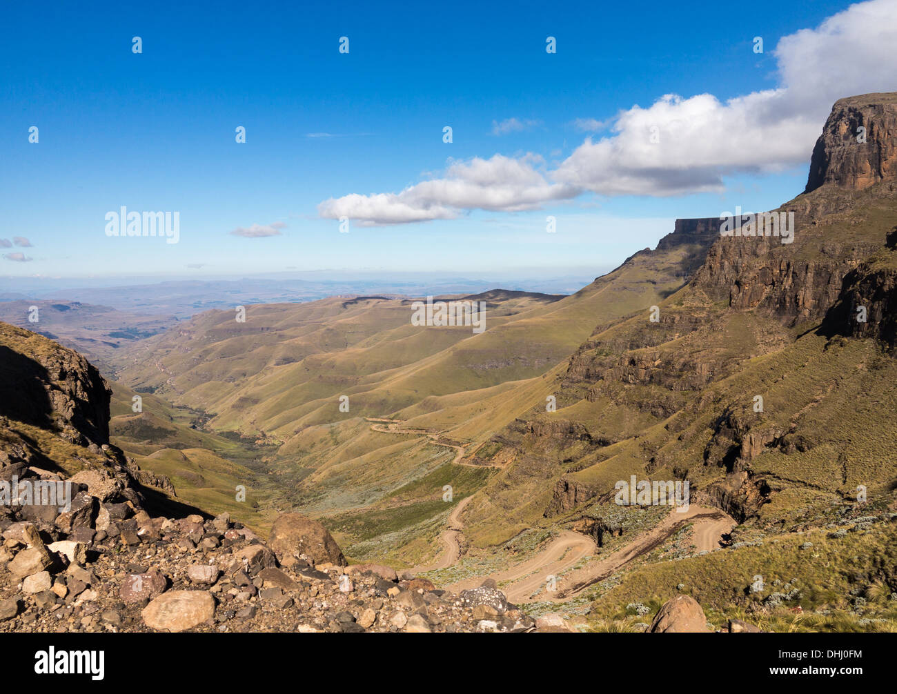 Valley and the winding road over mountains from South Africa to Lesotho over Sani Pass Stock Photo