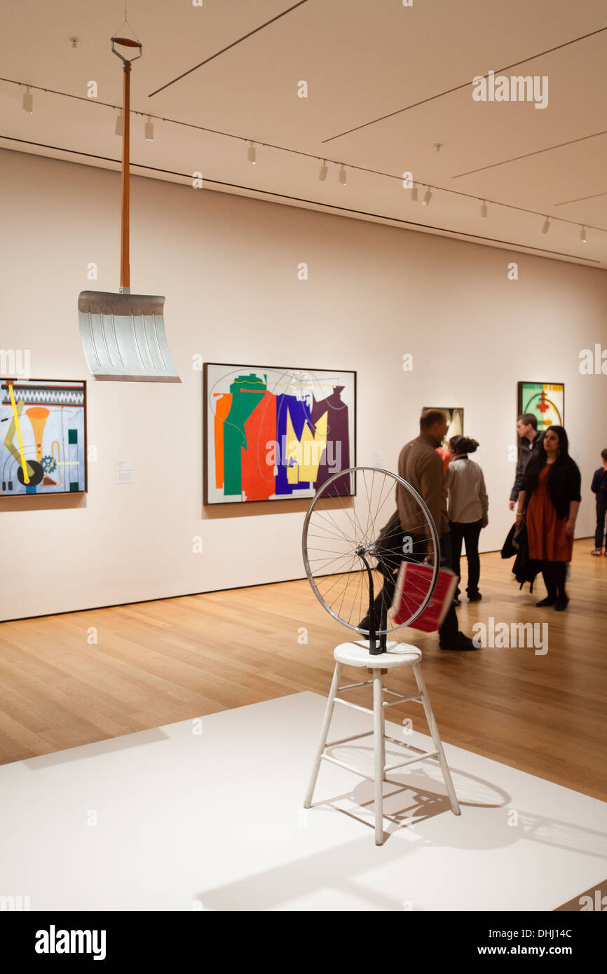 Marcel Duchamp's 'In Advance of the Broken Arm' and 'Bicycle Wheel' on display at The Museum Of Modern Art, New York, USA Stock Photo