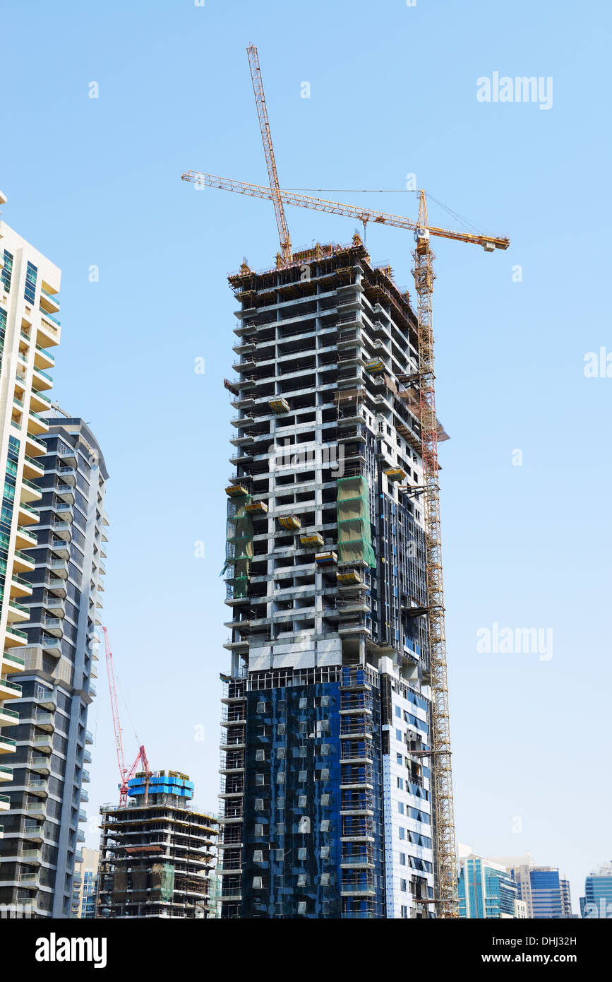The construction of new skyscraper in Dubai city on September 12, 2013 in Dubai, United Arab Emirates Stock Photo