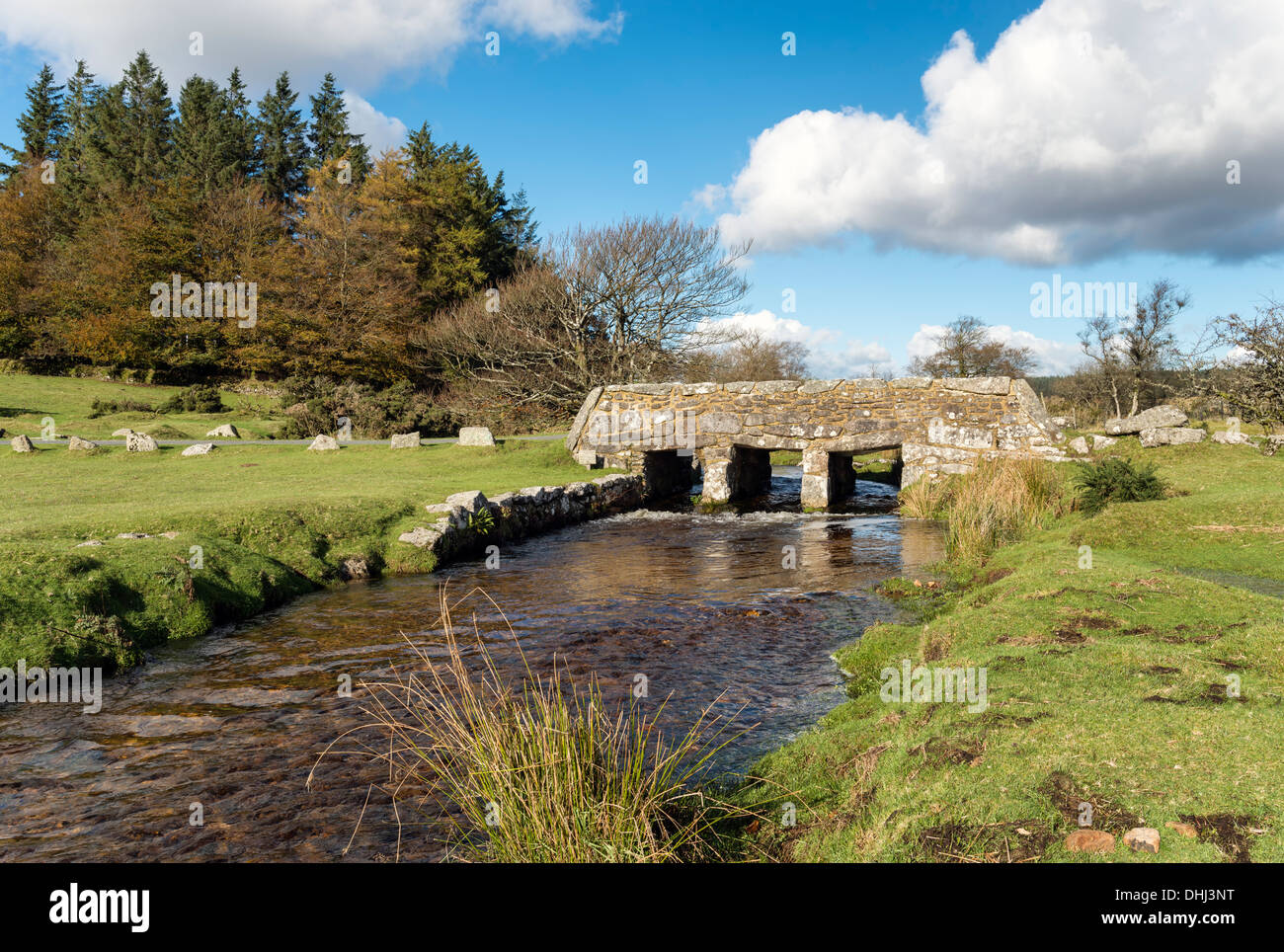An old stone bridge over Walla Brook near Bellever on Dartmoor National Park in Devon Stock Photo
