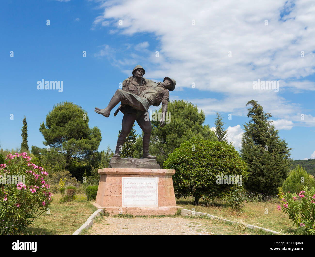 Turkish soldier carrying a wounded Allied soldier comrade in a WW1 Gallipoli campaign memorial statue, Anzac Cove, Turkey Stock Photo