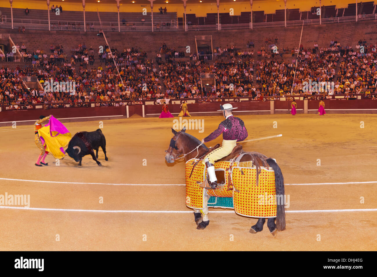 Matador and bull in bullfighting at Madrid Stock Photo