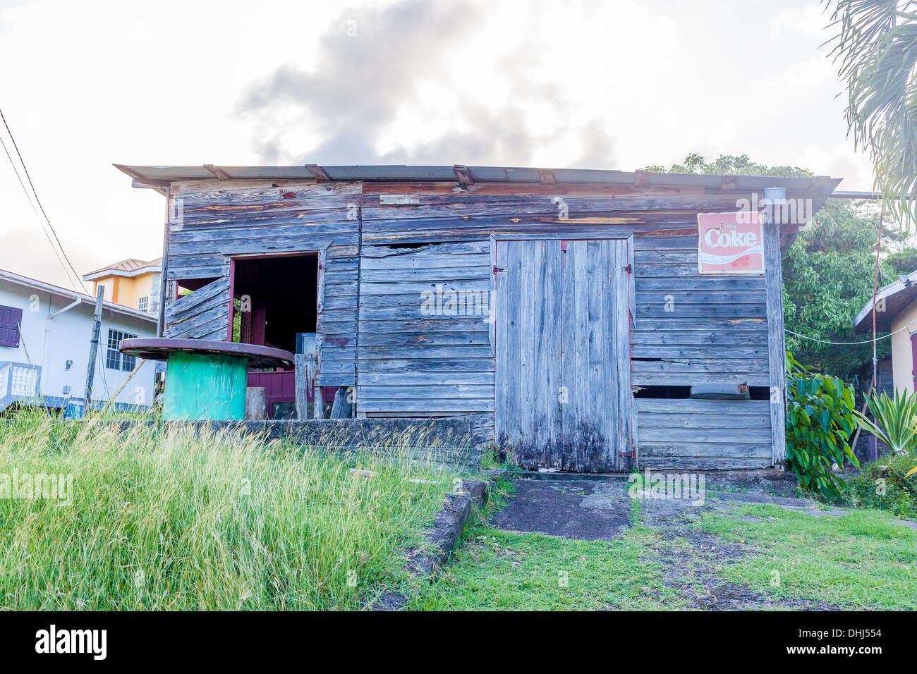 Coke advertising on building in poverty stricken area of grenada hires