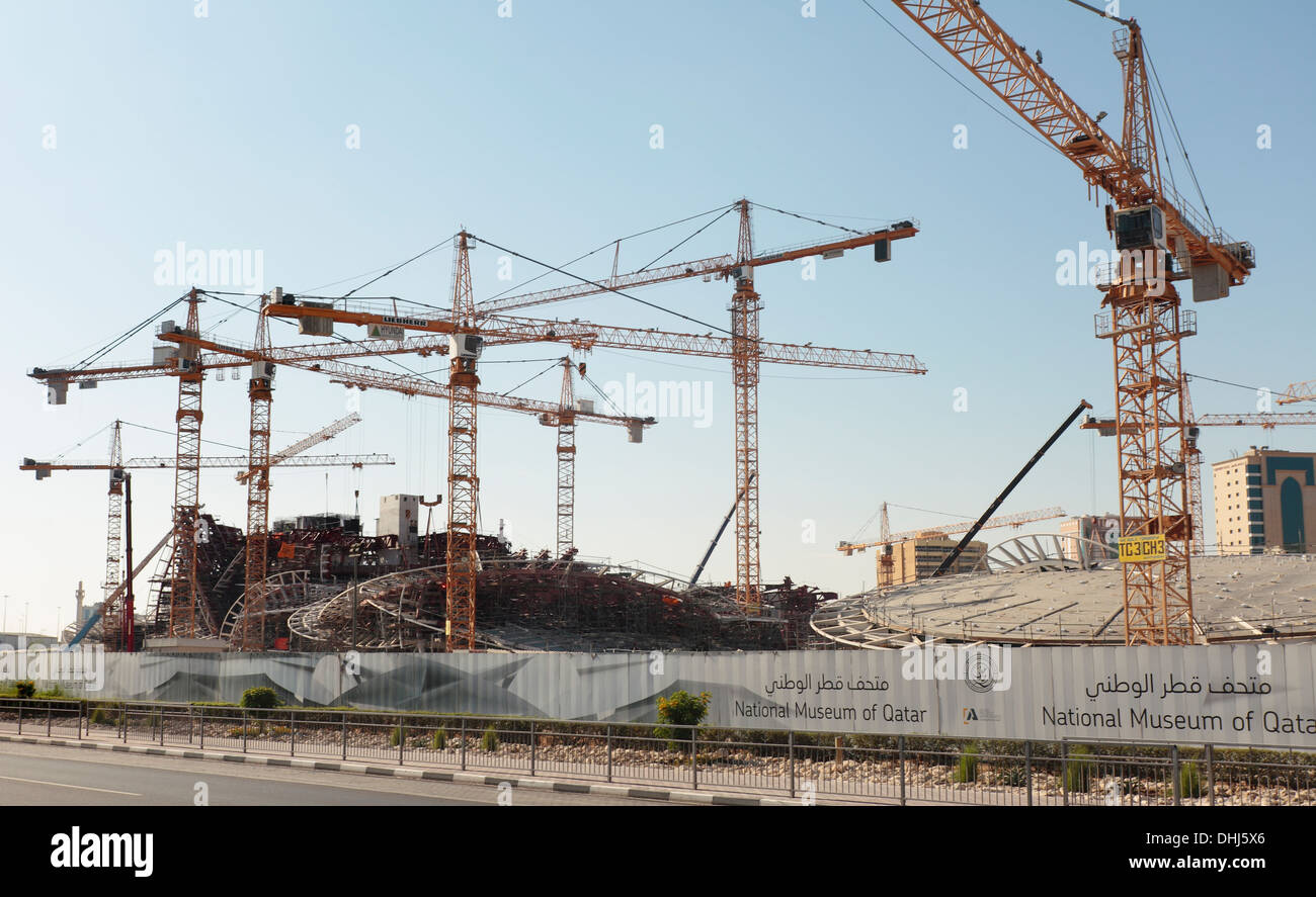 Qatar's bizarrely shaped new National Museum, structured like a huge crystal of desert rose, takes shape on Doha seafront Stock Photo