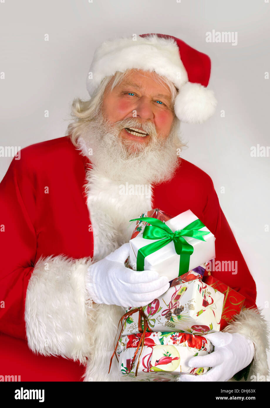 Santa Claus - Christmas figure of Santa Claus with gifts and boxes Stock Photo