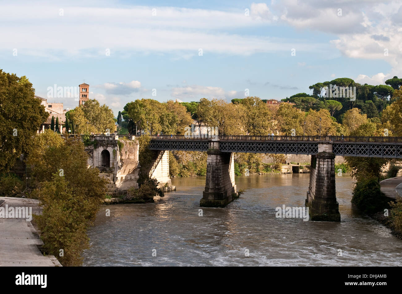 View of the river and industrial train bridge from the Tiber Island, Rome, Italy Stock Photo