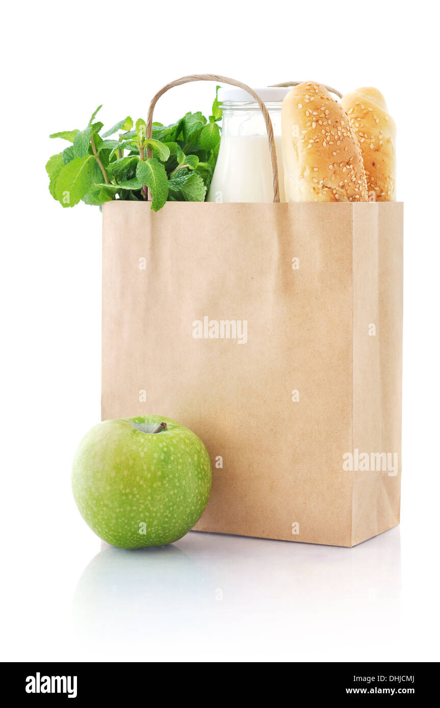 Brown paper bag with food isolated on a white background Stock Photo