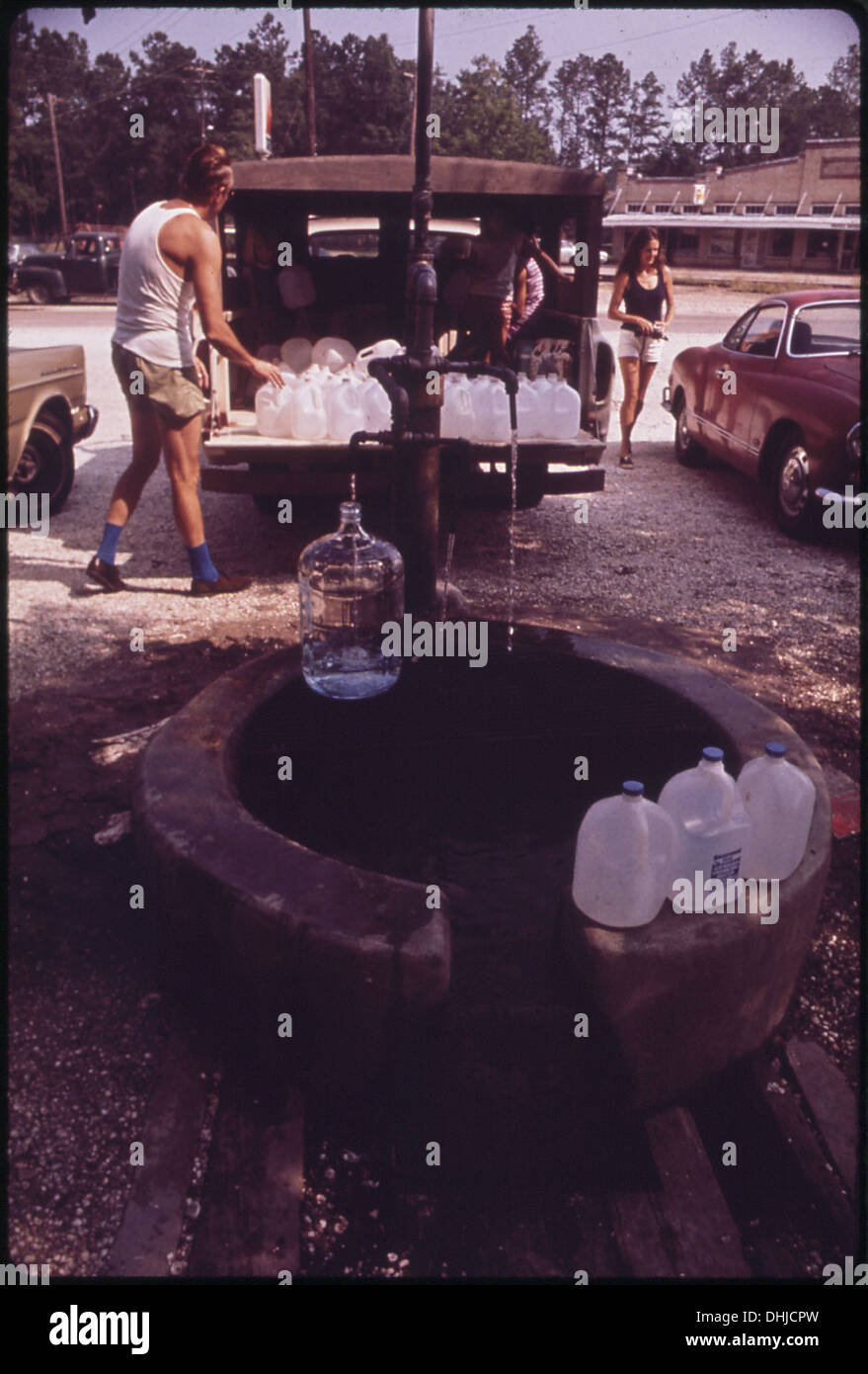 This image features an artesian water pump, a system that uses ...