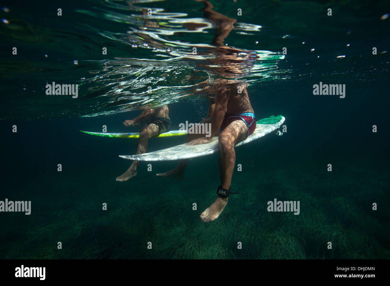 Underwater view of two surfers Stock Photo