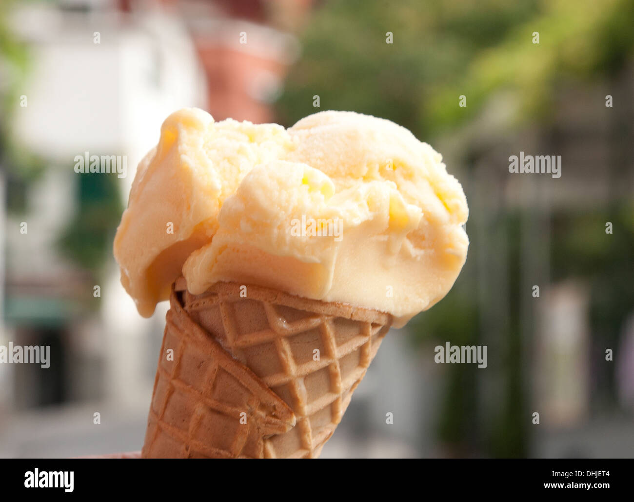 Melon flavored gelato is served in a sugar cone in Positan, Italy. Stock Photo