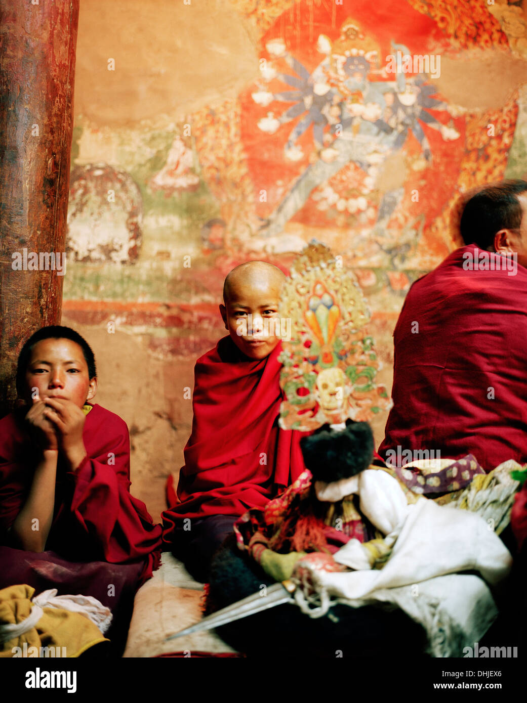 Young monks getting prepared for the dance of masks at the serenity room, during the Hemis Gonpa Festival at convent Hemis, sout Stock Photo