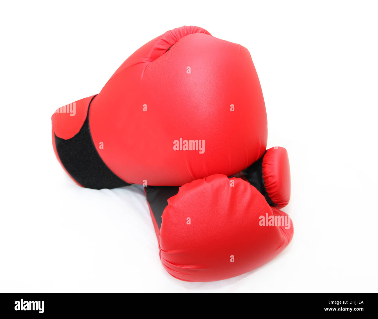 red boxing gloves isolated isolated in white Stock Photo