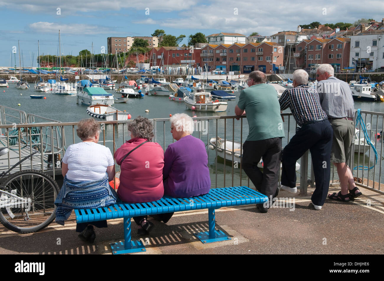 Mature tourists in Paignton marina, Paignton, Devon, UK. Stock Photo