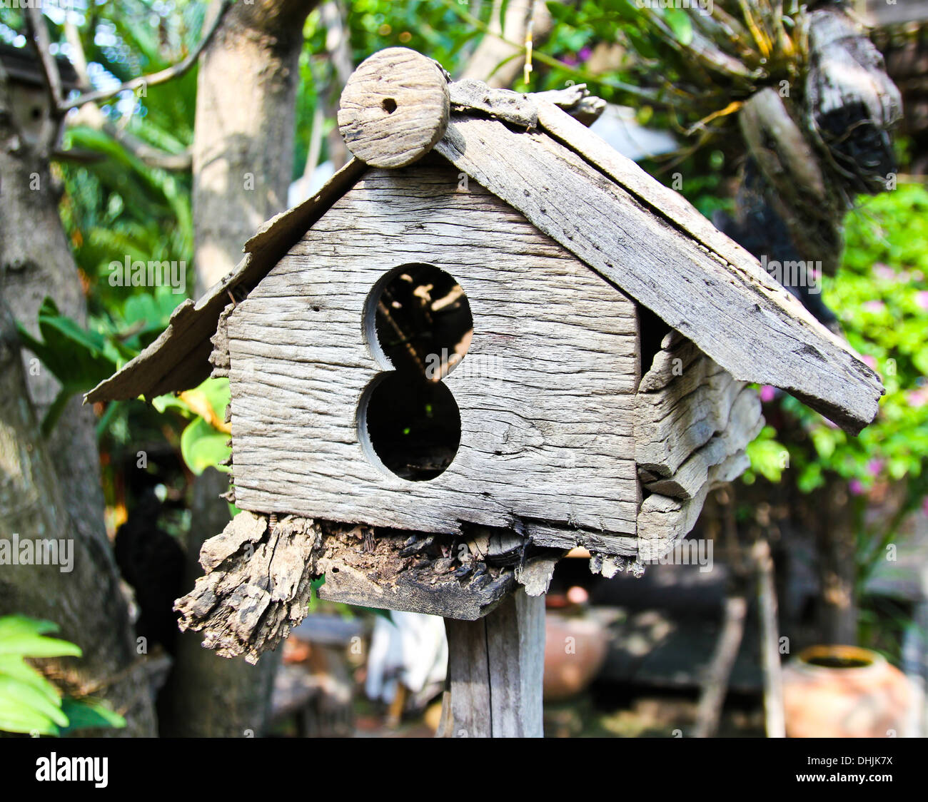 Old wooden birdhouse Stock Photo