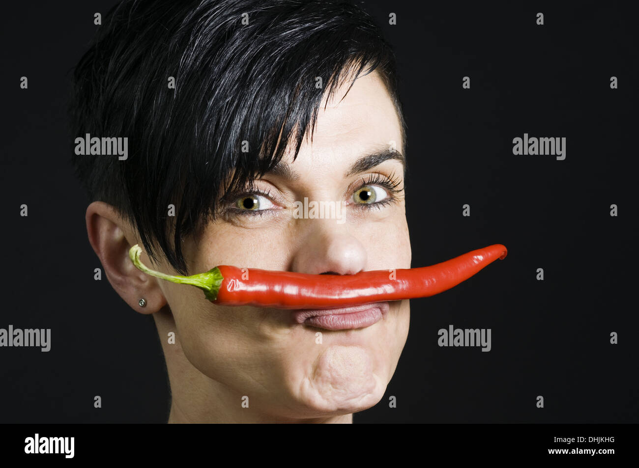 chilli on lips Stock Photo