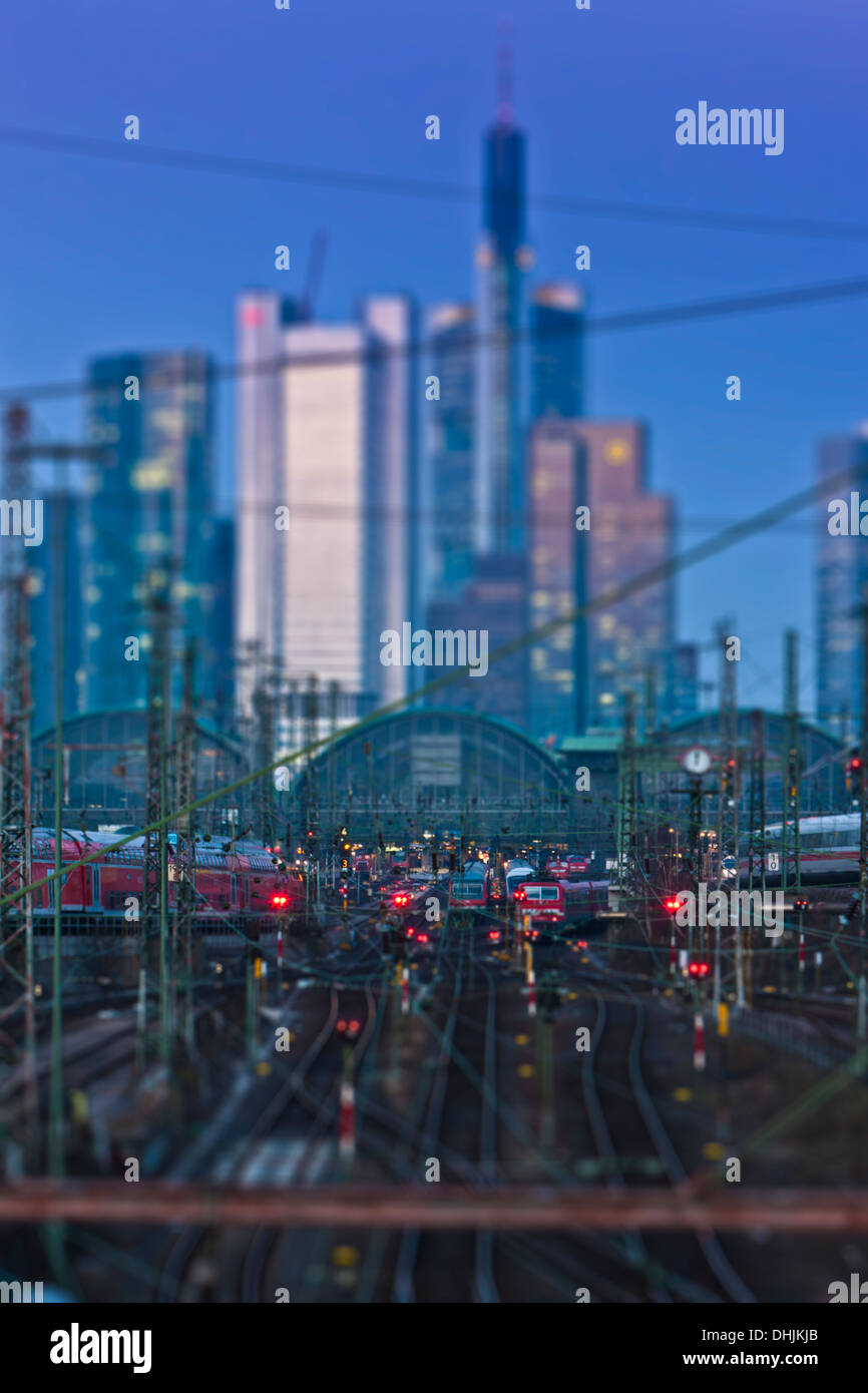 Germany, Hesse, Frankfurt, Tilt-shift view of central station with financial district in background Stock Photo