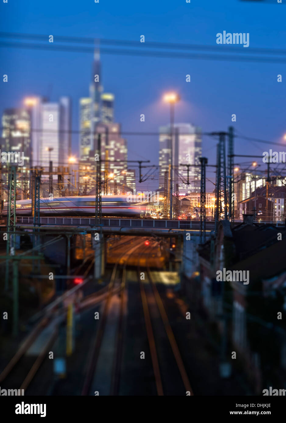 Germany, Hesse, Frankfurt, Tilt-shift view of central station with financial district in background Stock Photo