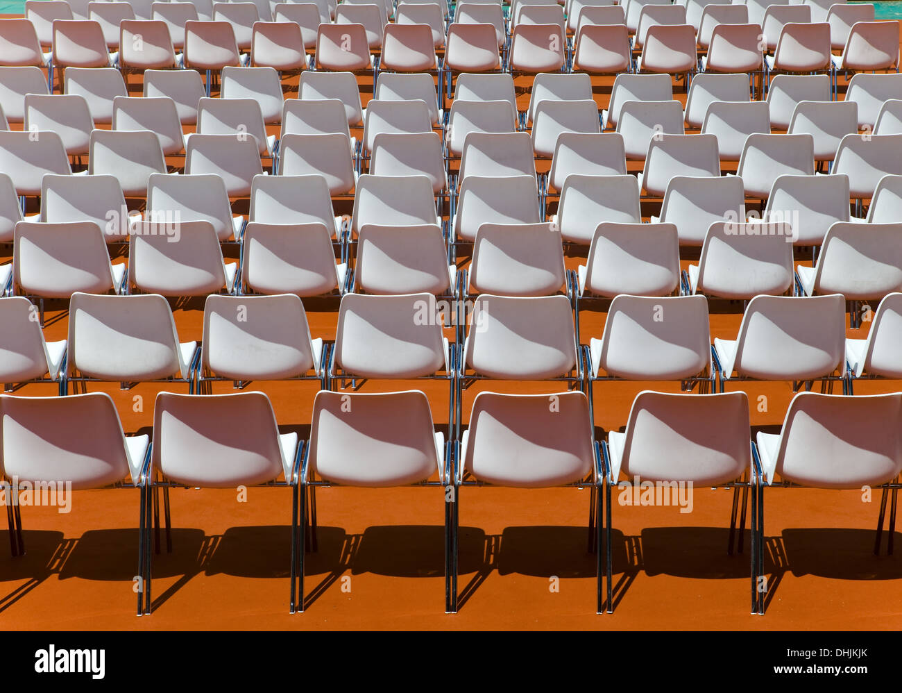 Empty rows of seats backs to spectator Stock Photo