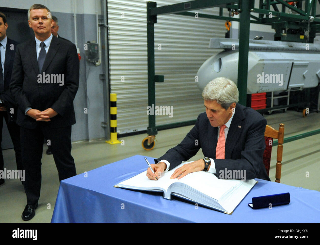 Secretary Kerry Signs the Guestbook at the Lask Polish Airbase Stock Photo