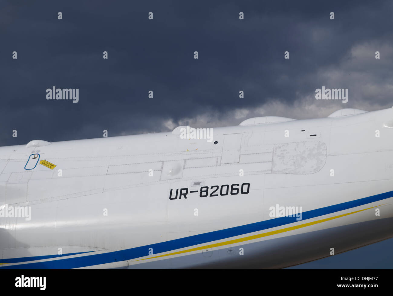 Part of the gigantic Antonov An-225 Mriya fuselage with visible registration number. Stock Photo