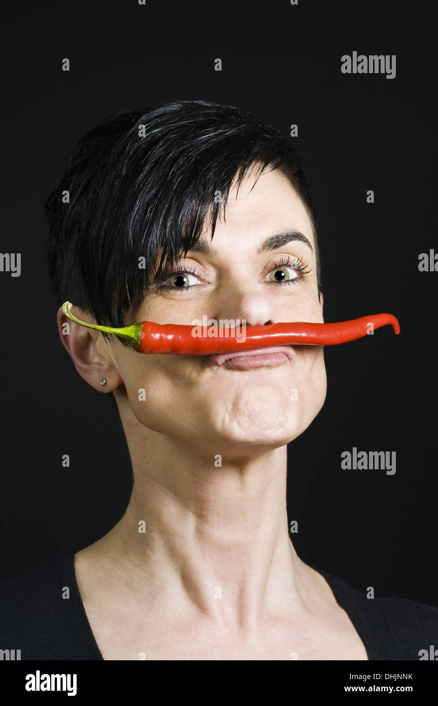 woman with chilli Stock Photo