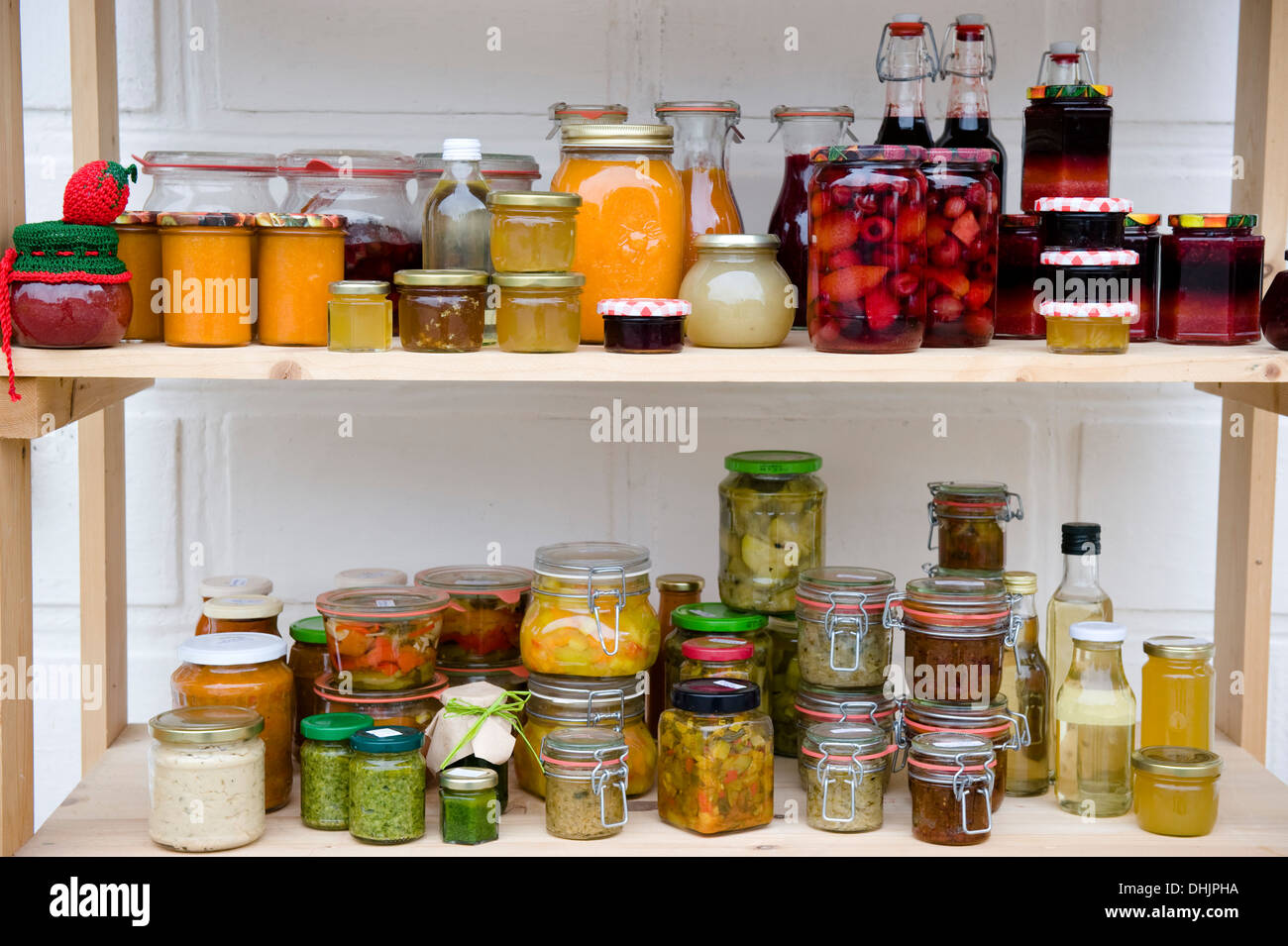 https://c8.alamy.com/comp/DHJPHA/food-larder-with-shelves-of-homemade-products-homemade-DHJPHA.jpg