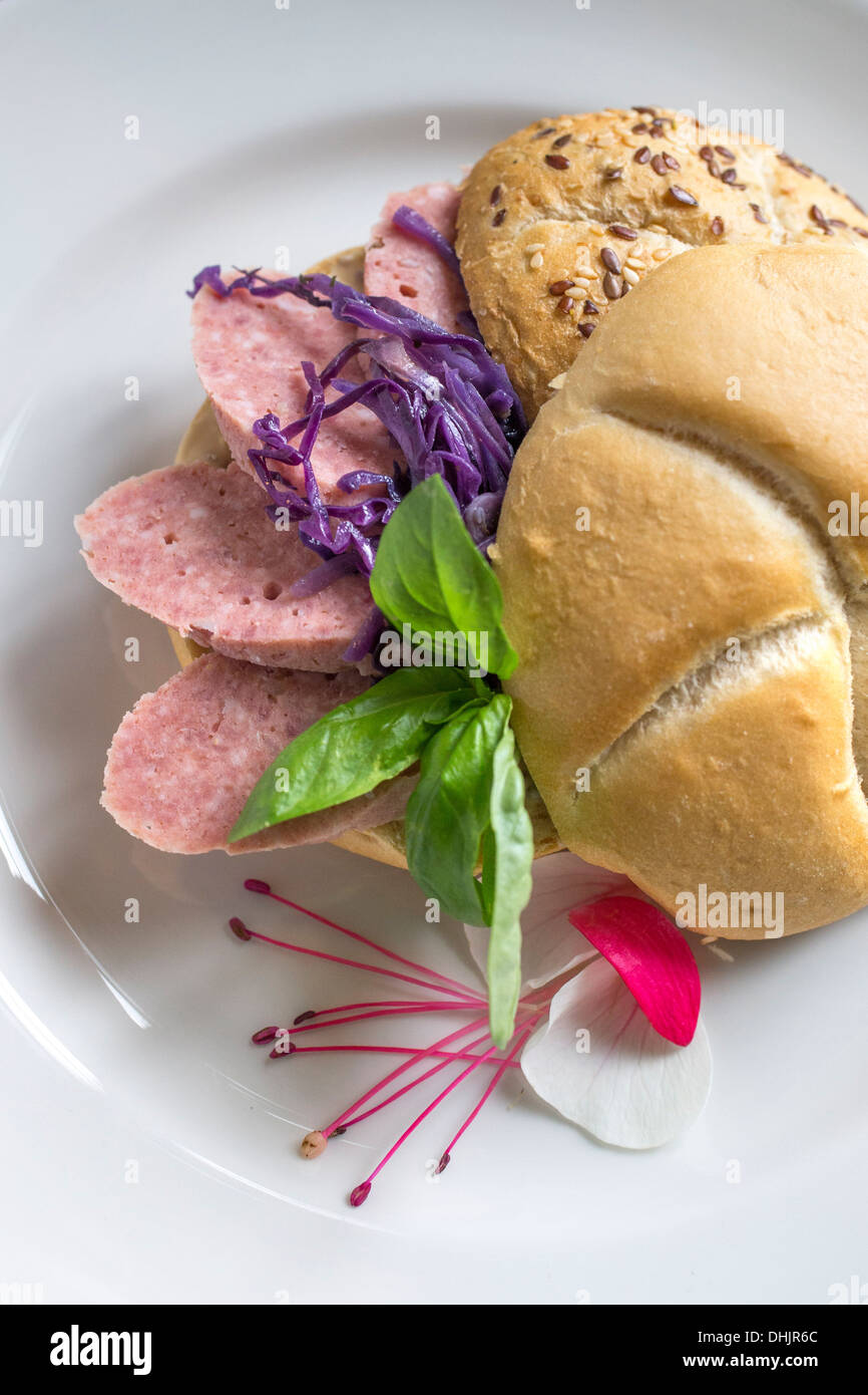 Sandwich with homemade wurst. Restaurant Bordò, Torino, Piedmont, Italy. Stock Photo