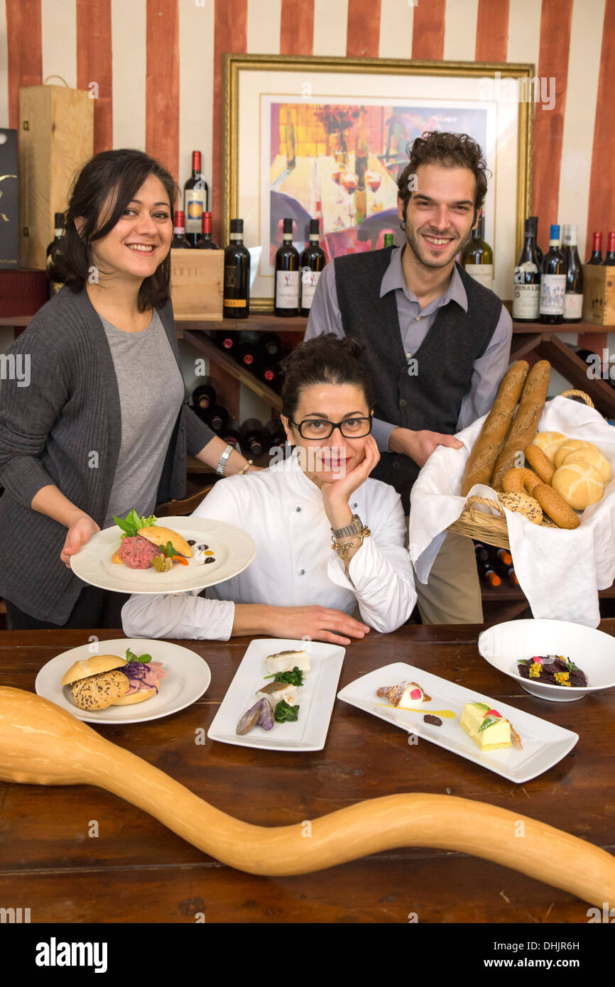 Francesca Bordonaro, chef, with some of her dishes. Restaurant Bordò, Torino, Piedmont, Italy. Stock Photo