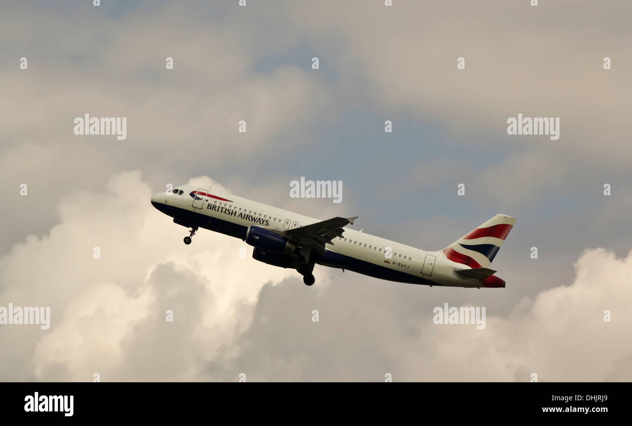 british airways airbus a320-232 plane taking off from ringway / manchester airport runway Stock Photo
