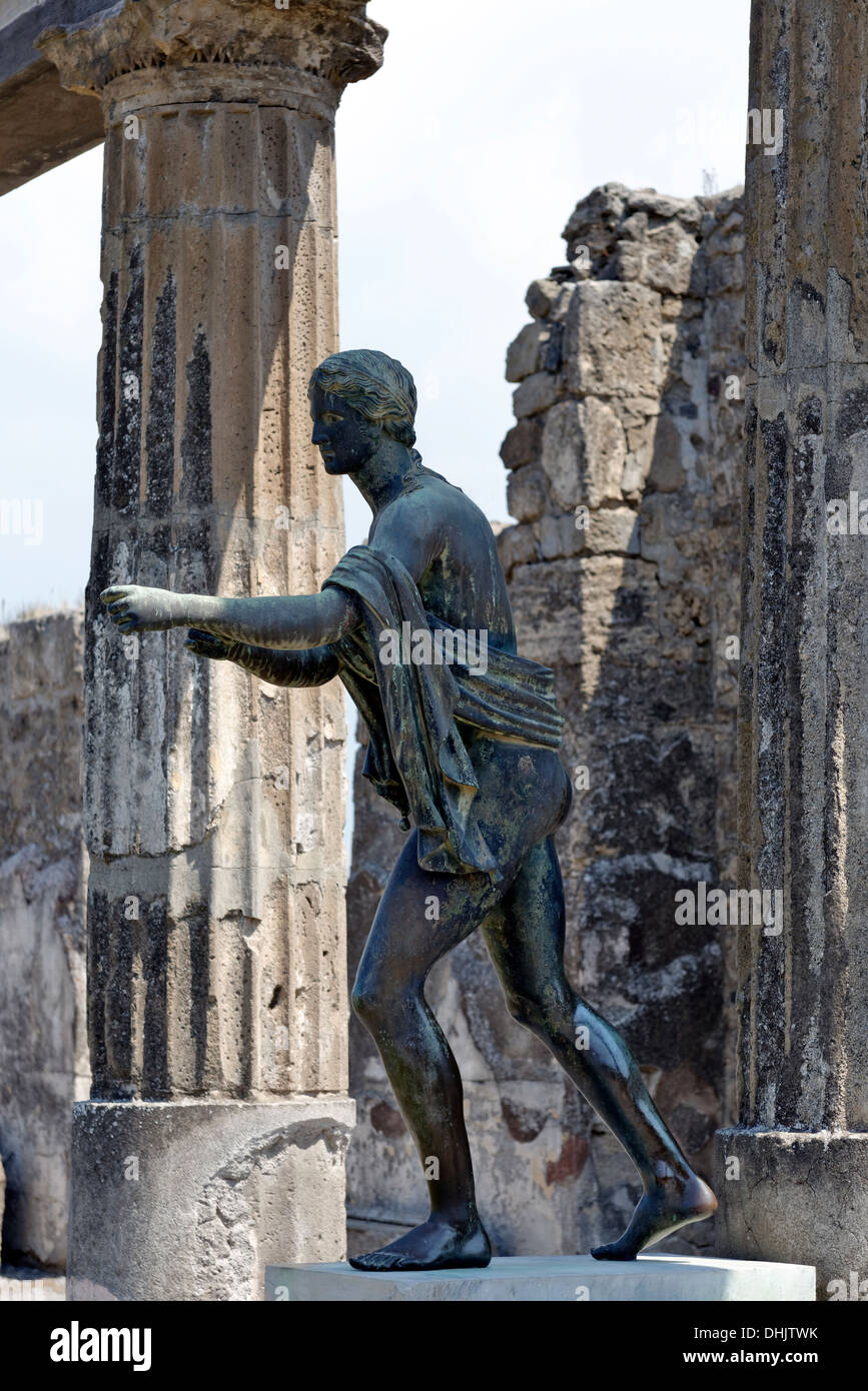 Bronze copy of the original statue of Apollo in front of the portico at the sanctuary of Apollo at Pompeii, Italy. Stock Photo