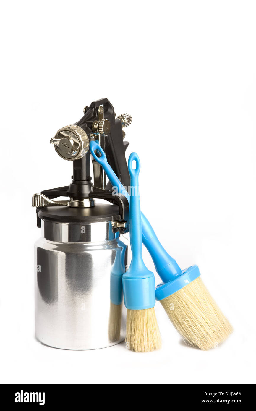 New metal brilliant Spray gun And brush Stock Photo Alamy