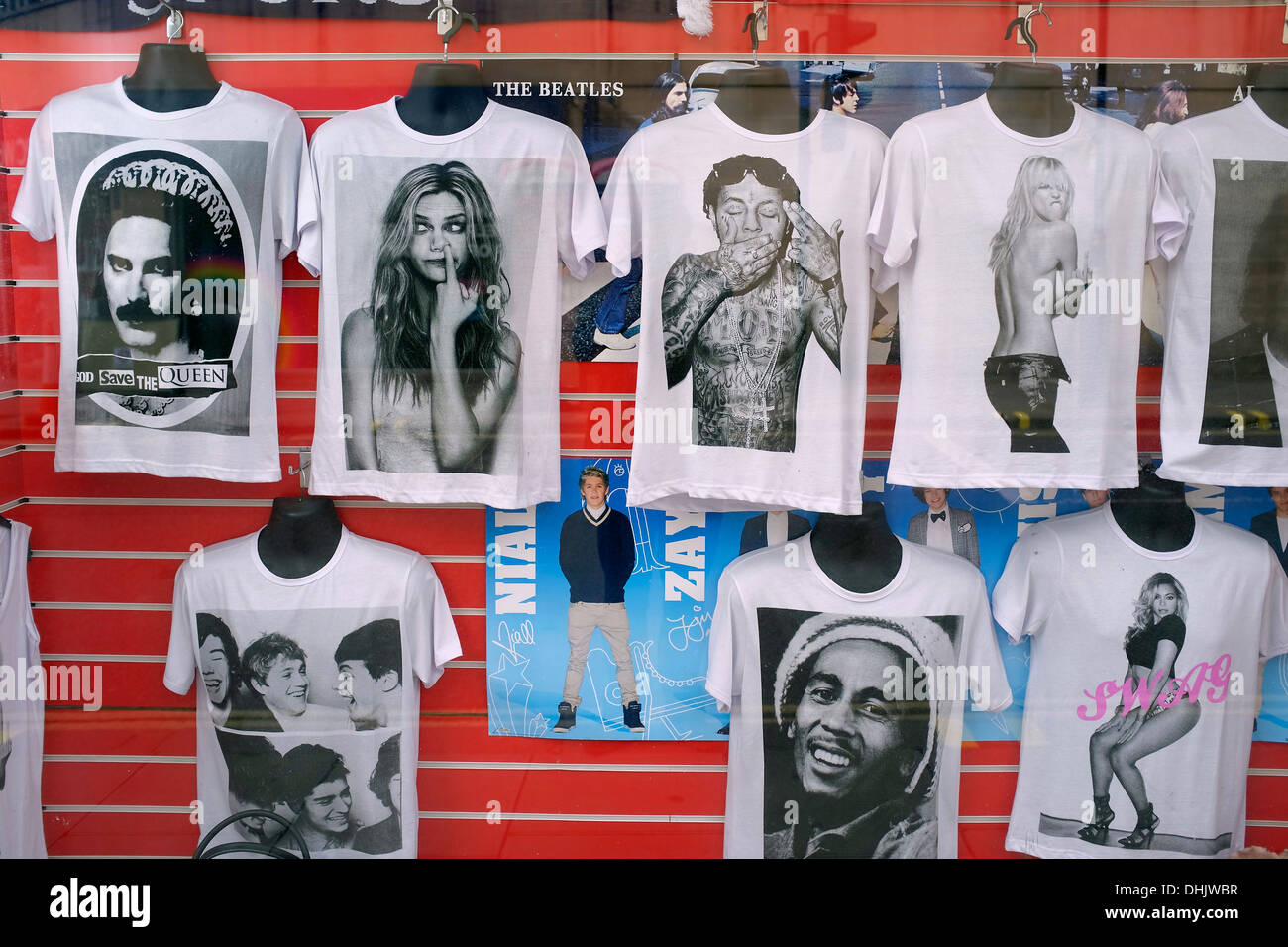 T-shirts in shop window, London Uk Stock Photo