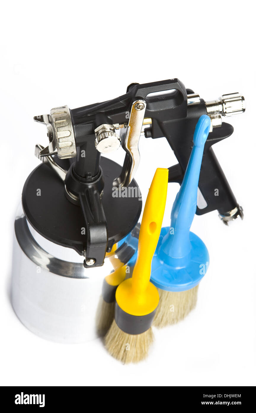 New metal brilliant Spray gun And brush Stock Photo Alamy